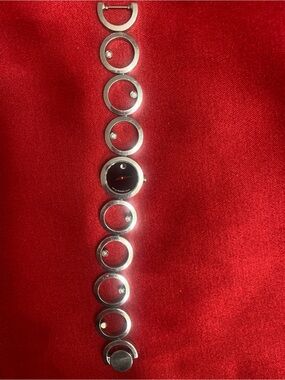 Movado Silver and Black Circle Link bracelet with crystal diamonds.